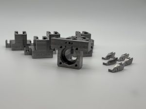 Machined clamp blocks for fixture plates in an automated assembly cell