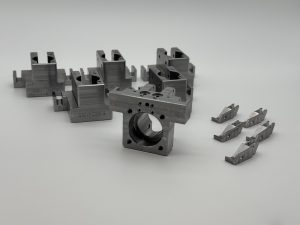Machined clamp blocks for fixture plates in an automated assembly cell