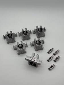 Machined clamp blocks for fixture plates in an automated assembly cell