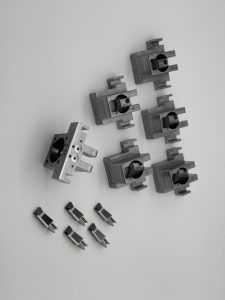 Machined clamp blocks for fixture plates in an automated assembly cell