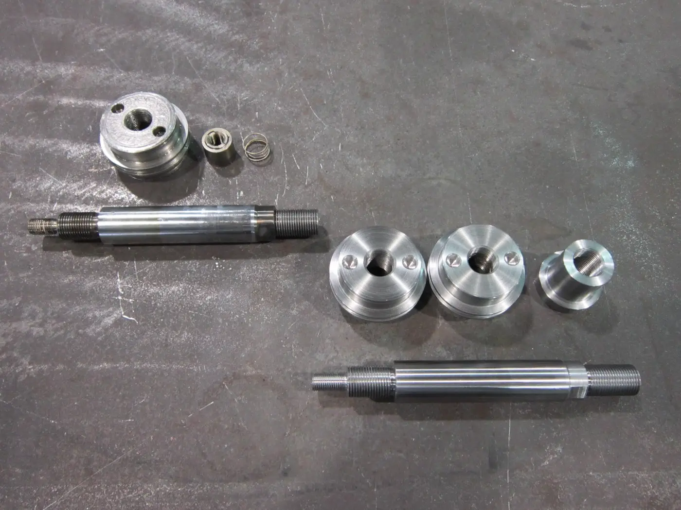 Turned shafts and bored rings machined at Custom Concepts